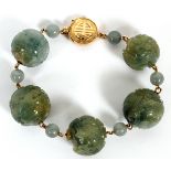 CHINESE JADE CARVED BALL BRACELETChinese carved balls with jade beads and gold clasp with Chinese