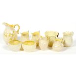 BELLEEK PORCELAIN CREAMERS, SUGAR BOWLS & MUG, C. 1946-1996, NINE PIECES, H 2"-6"Including 5 cream