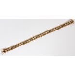 ITALIAN 14KT YELLOW GOLD AND DIAMOND BRACELET, L 7 1/4"A 14kt gold bracelet studded with 63 round