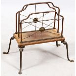 REGENCY BRONZE & OAK CANTERBURY, C.1810, H 17", W 21"With bronze feet and dividers, set on a wood