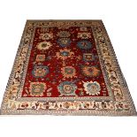 TURKISH HAND WOVEN WOOL RUG, W 5' 8'', L 7' 3'', "TRIBAL BLOSSOM"A Woven Legends rug.Good