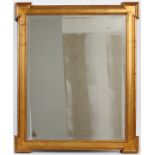 GILT PAINTED WALL MIRROR, H 33'', W 27''With bevel glass and square form features at the corners.