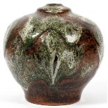 PLOEN (NORWAY, 20TH C.) STUDIO POTTERY VASE, H 8", DIA 8"Mottled glaze of brown, black, white and