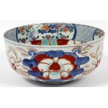 JAPANESE IMARI PORCELAIN BOWL, C. 1850, H 4", DIA 8 1/2"Decorated in blue, red and green.Good