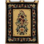 FLORAL MACHINE MADE TAPESTRY H 42" W 23"Depicts a floral bouquet on a beige ground with a wide