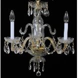 THREE-LIGHT CRYSTAL CHANDELIER, H 22", DIA 16"Having three scroll form arms, crystal bobeches,