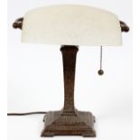 BRADLEY & HUBBARD BRONZE AND GLASS DESK LAMP, H 11.25"Featuring a bronze base with floral designs on