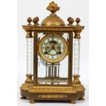 WATERBURY BRONZE MANTLE CLOCK, CRYSTAL COLUMNS, H 13"A gilt bronze and crystal regulator clock, c.