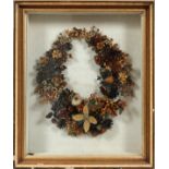 VICTORIAN SEED WREATH IN SHADOWBOX FRAME, H 25", W 20"The wreath measures H.16" x 13"