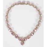 114CT NATURAL PINK KUNZITE AND DIAMOND NECKLACE, L 16"A 114ct natural oval pink kunzite necklace;