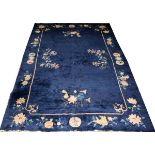 CHINESE HAND WOVEN CARPET CIRCA 1920, 5'11" X 8'8"Blue field. Motif of Chinese vases.Good condition.