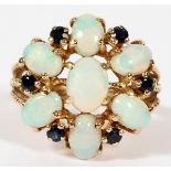 14KT YELLOW GOLD, OPAL & SAPPHIRE RINGA 14kt yellow gold mount set with seven opals alternating with