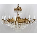 BRASS AND CRYSTAL CHANDELIER DIA 28"Eight arms. Circa 1960. Hand cut crystal prisms. Height 21"