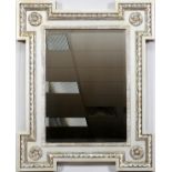 CONTEMPORARY SILVER GILT LEAF MIRROR, 53" X 43"Having a beveled mirror with leaf edging and circular