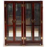 TWO "CHINESE" GLASS CURIO CABINETS, LIGHTED, WITH BRASS HARDWARE. EACH HAVING 4 TEMPERED GLASS