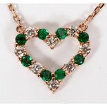 .40CT EMERALD AND DIAMOND NECKLACE, L 16 1/2"A .40ct emerald and .30ct diamond heart pendant