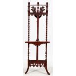 EASTLAKE CARVED WALNUT EASEL, H 60", L 20"Featuring carvings of swans and leaves at the top with