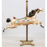 C. W. PARKER WOOD CAROUSEL HORSE, 1920'S, H 24", L 55"A jumping horse with carved leaves at the back