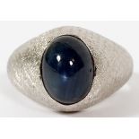 OVAL 4 CT STAR SAPPHIRE RING, SIZE 7 1/4An oval cabochon star sapphire in a brushed 14kt white