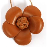 CHANEL TAN LEATHER CAMELLIA NECKLACE, L 34"Tan leather with camellia pendant. Labeled: Chanel,