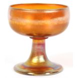 IRIDESCENT GLASS WINE/SHERBET, H 3 1/2"A round bowl on a flaring stem and foot; signed "L. C. T.