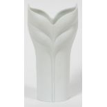 ROSENTHAL STUDIO PORCELAIN VASE, H 7"A bisque vase in floral form, marked at the underside and