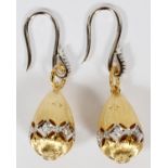 18KT GOLD AND DIAMOND DANGLE EARRINGS, PAIR, H 1 1/4"A pair of 18kt yellow and white gold drop