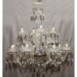 WATERFORD CRYSTAL 12 LIGHT CHANDELIER, H 39", DIA 35"Two tiers with crystal prisms. Signed and