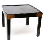 TOMLINSON, EBONY SIDE TABLE, H 16", W 22", D 22"Fitted with brass corners, and 'Fine Furniture by