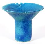 H. BULDDI, POTTERY CENTERPIECE, H 6 1/2" DIA 7 1/2"having a blue ground. Notches to the rim.Hairline