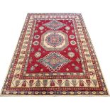 AFGHAN KAZAK ALL WOOL, HAND WOVEN RUG, 10' 2" X 7' 5"Red field with 3 geometric medallions.- For
