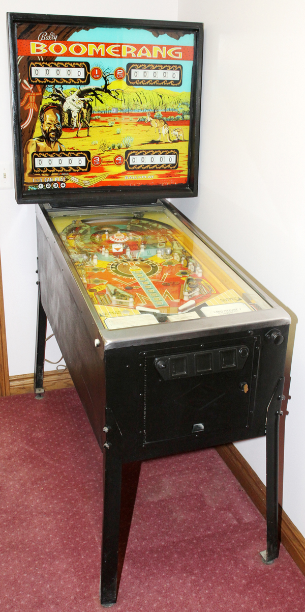 BALLY BOOMERANG, 25 CENT, PINBALL MACHINE, FOUR PLAYERS, H 70", W 30 1/2", D 53"Bally Boomerang four