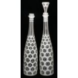 CONTINENTAL OVERLAY GLASS DECANTERS, LATE 19TH C., 2 PIECES, H 16"Each with white overlay cut to