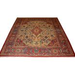 TURKISH HAND WOVEN RUBIA RUG, W 8', L 8' 1"Having a beige ground, with red and blue accents.Slight
