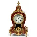 V DEPOSE, FRENCH STYLE MANTLE CLOCK, H 12.25"Having brass figural, flower and leaf ormolu, porcelain