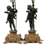 PATINATED METAL FIGURAL LAMPS, PAIR, H 26"Each is mounted with a putto support on a pedestal base.