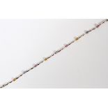 14KT LADY'S COLORED SAPPHIRE BRACELET, L 7.5"Featuring nine colored sapphires (pink and yellow)