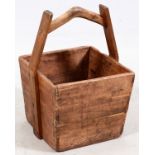 CHINESE CARVED WOOD TINDER BUCKET, H 23", W 16 1/2", D 15"A handled tinder bucket.Wear overall, in