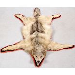 COYOTE RUG, W 48", L 61"Full body coyote skin rug with felt backing.Good condition. JMF- For High