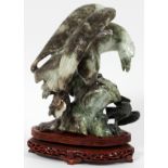 CARVED SERPENTINE SCULPTURE WITH WOOD STAND, H 9" (W/O STAND), EAGLEDepicts a carved serpentine