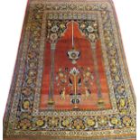 TABRIZ PERSIAN RUG, ANTIQUE, 5' 10" X 4' 4"An orange-red ground, with a heavy leaf motif of orange