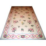 FRENCH STYLE FLAT WOVEN CARPET, W 5' 10", L 9' 11"An ivory ground with a ribbon and floral border.