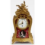 AUSTRIAN DORE BRONZE AND ENAMEL BRACKET CLOCK, C. 1900, H 10 1/2", W 5 1/2"Hand painted red ground