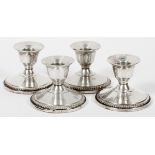 STERLING WEIGHTED CANDLESTICKS TWO PAIRS H 3"Four candlesticks.Show use. Dents. Jw- For High