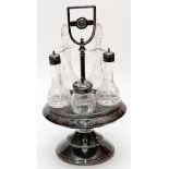 AMERICAN VICTORIAN SILVERPLATE REVOLVING CRUET STAND, C.1880, H 14 3/4"A round revolving stand