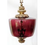 GILT METAL AND BLOWN GLASS HANGING SHADE, H 20'' GLOBE, H 29'' CHAINRuby glass shade.- For High