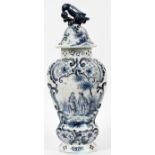 DELFT POTTERY COVERED URN, H 18.25"Blue transfer depicting a courting scene and having a bird finial