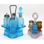 AMERICAN PATTERN GLASS CRUET STANDS, LATE 19TH C., 2 PIECES, H 7"-9 1/2"Including 1 blue glass cruet