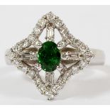 LADY'S TSAVORITE GARNET AND DIAMOND RING, 14KT Featuring a central tsaborite garnet surrounded by