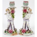 PORCELAIN CHERUB CANDLESTICKS, C. 1920, PAIR, H 10",Two hand painted cherub figural candlesticks,